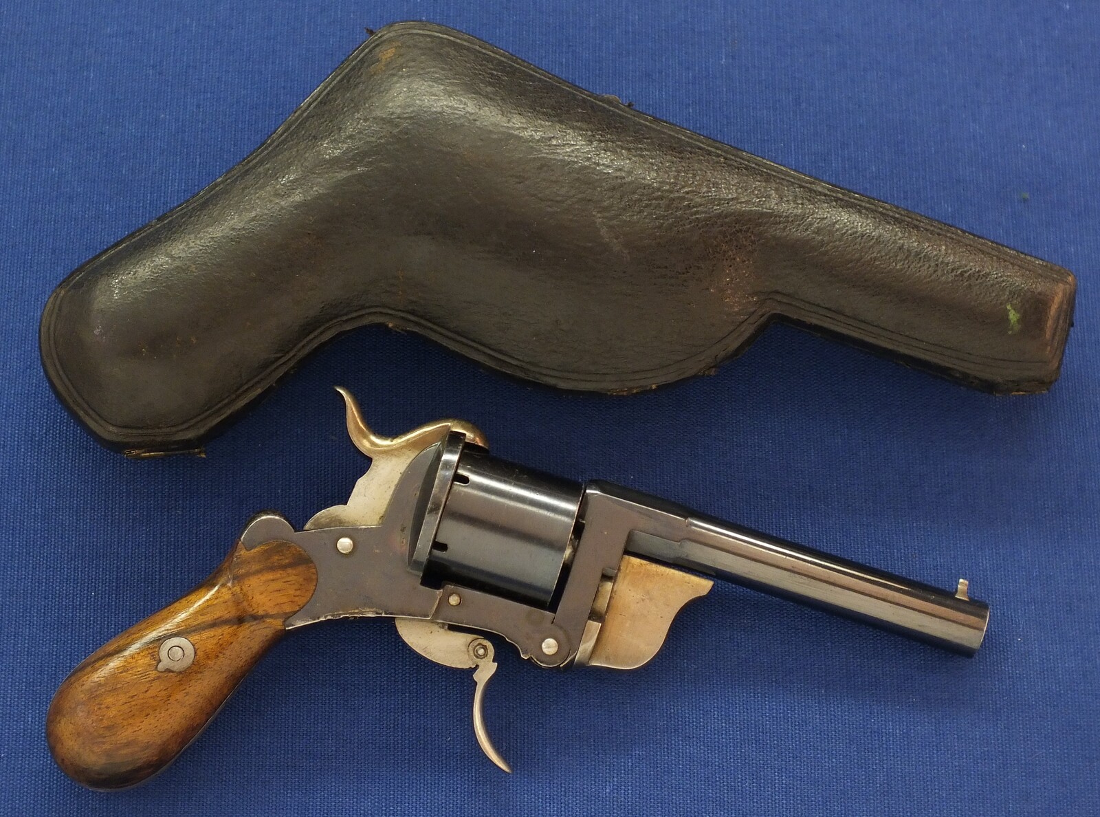 A rare and fine antique French Pipe-Cased 6 shot 7mm Pinfire Revolver by J.B. EYRAUD'S French patent nr. 71170 April 26, 1866 Tip-down barrel design. Length 20cm. In near mint condition. Price 2.250 euro.