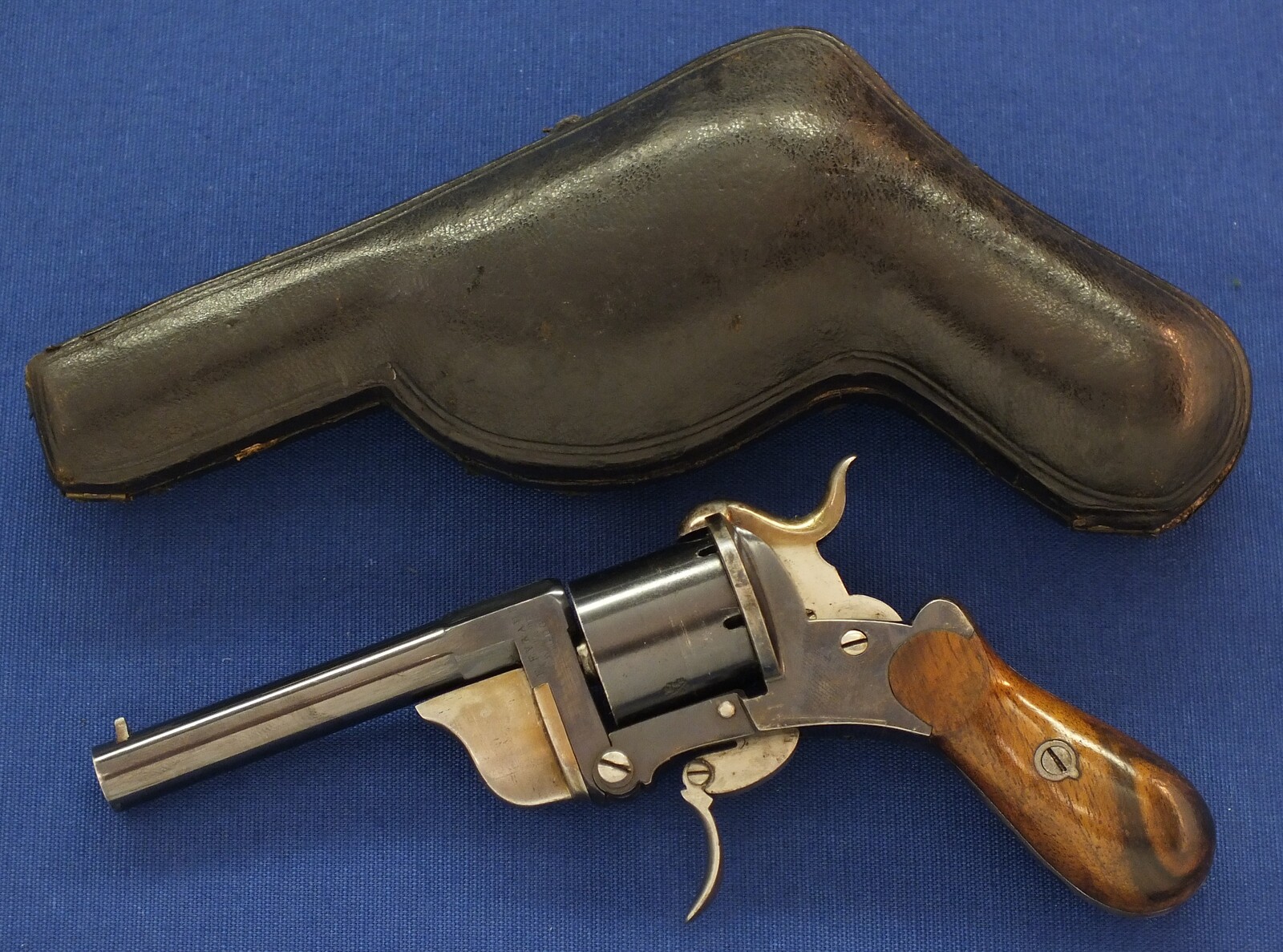 A rare and fine antique French Pipe-Cased 6 shot 7mm Pinfire Revolver by J.B. EYRAUD'S French patent nr. 71170 April 26, 1866 Tip-down barrel design. Length 20cm. In near mint condition. Price 2.250 euro.