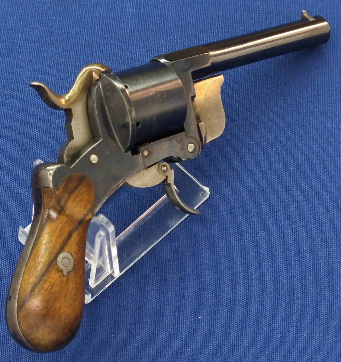 A rare and fine antique French Pipe-Cased 6 shot 7mm Pinfire Revolver by J.B. EYRAUD'S French patent nr. 71170 April 26, 1866 Tip-down barrel design. Length 20cm. In near mint condition. Price 2.250 euro.