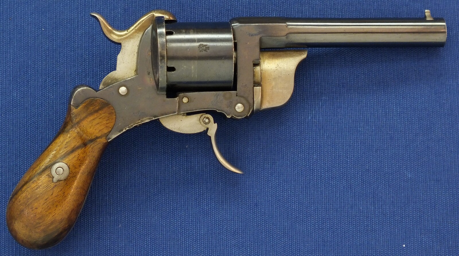 A rare and fine antique French Pipe-Cased 6 shot 7mm Pinfire Revolver by J.B. EYRAUD'S French patent nr. 71170 April 26, 1866 Tip-down barrel design. Length 20cm. In near mint condition. Price 2.250 euro.
