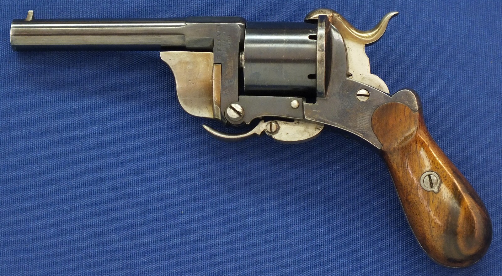 A rare and fine antique French Pipe-Cased 6 shot 7mm Pinfire Revolver by J.B. EYRAUD'S French patent nr. 71170 April 26, 1866 Tip-down barrel design. Length 20cm. In near mint condition. Price 2.250 euro.
