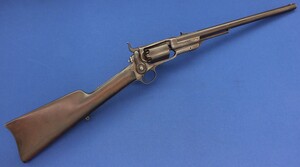 A rare antique American Civil War Colt Model 1855 Cavalry Revolving saddle ring percussion Carbine. 44 caliber with 18 inch barrel. Length 92cm. In good condition. Price 4.250 euro.