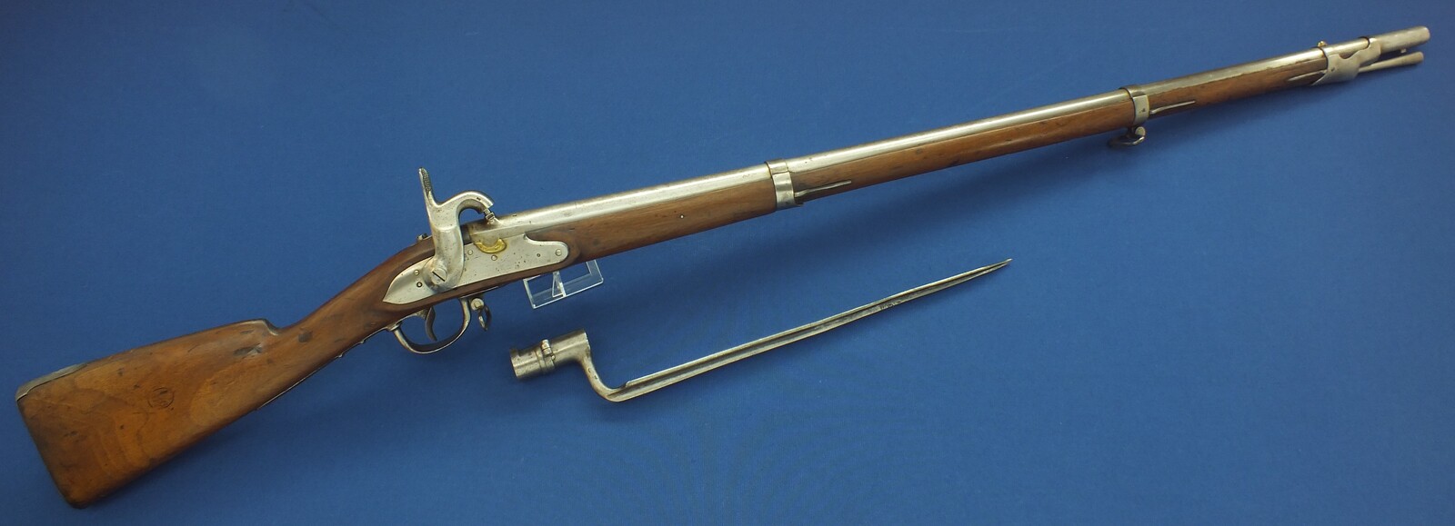 A rare antique Dutch Model 1815 Percussion Musket with Bayonet, converted from flintlock and made in Suhl Germany. Caliber 17,5 mm, length 143 cm, in very good condition.
