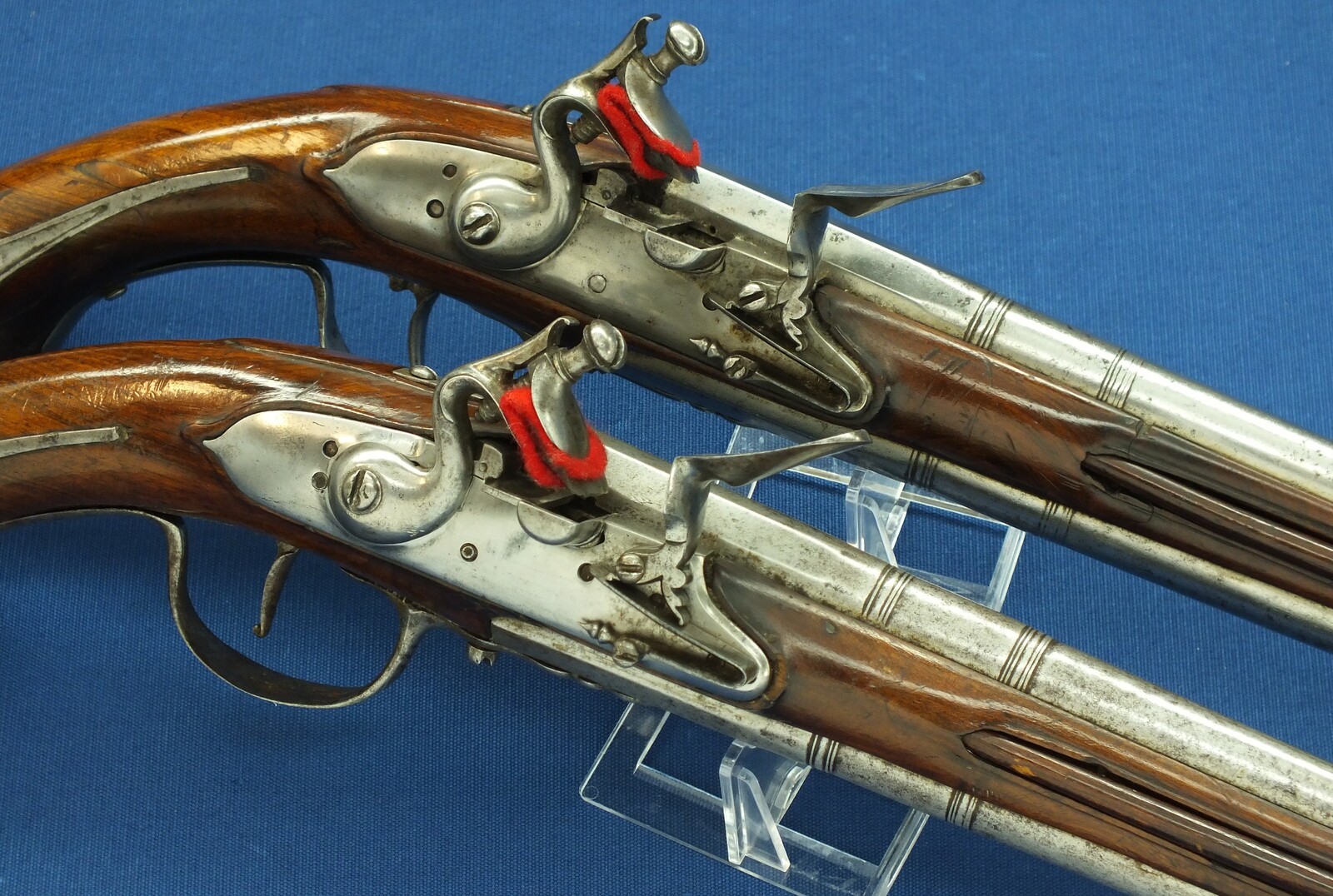 A rare antique Dutch or French 17th century circa 1660-70 Pair of over and under Flintlock pistols with Belt-hooks. Caliber 12mm, length 52. In very good condition. Price 12.500 euro.
