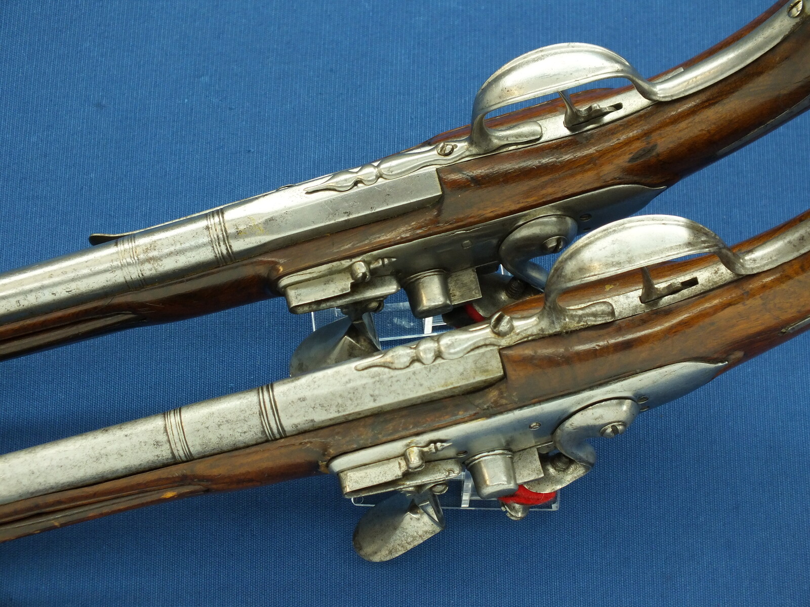 A rare antique Dutch or French 17th century circa 1660-70 Pair of over and under Flintlock pistols with Belt-hooks. Caliber 12mm, length 52. In very good condition. Price 12.500 euro.