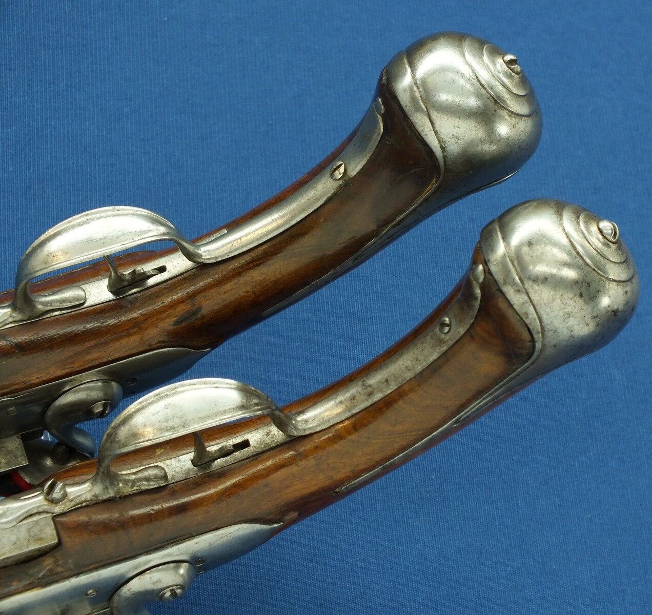 A rare antique Dutch or French 17th century circa 1660-70 Pair of over and under Flintlock pistols with Belt-hooks. Caliber 12mm, length 52. In very good condition. Price 12.500 euro.