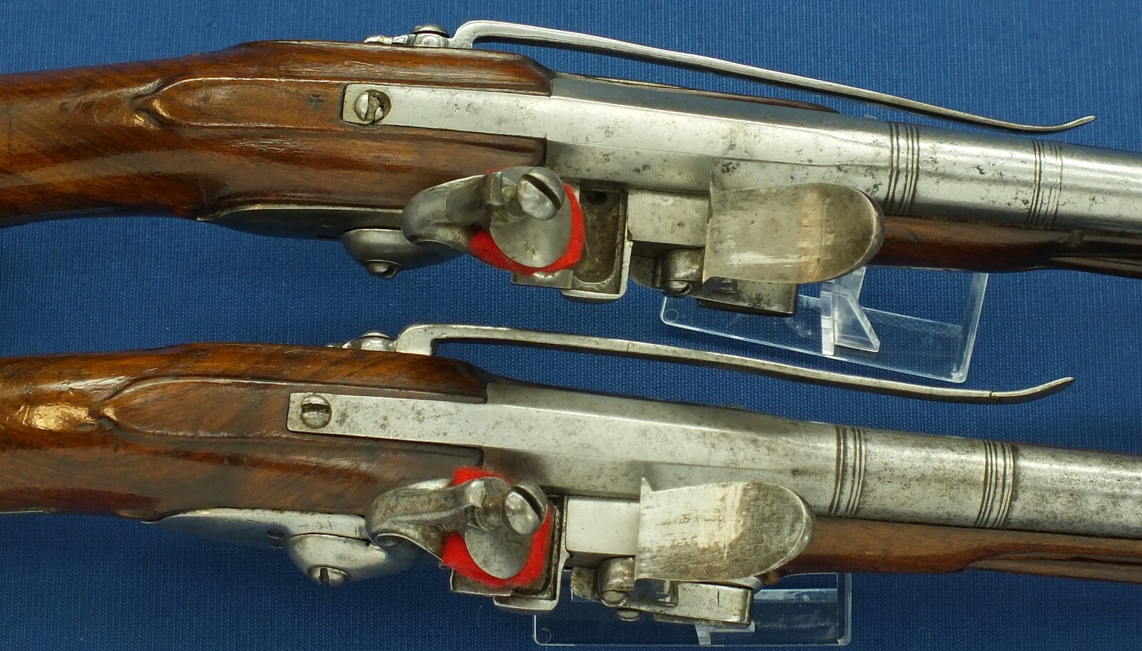 A rare antique Dutch or French 17th century circa 1660-70 Pair of over and under Flintlock pistols with Belt-hooks. Caliber 12mm, length 52. In very good condition. Price 12.500 euro.