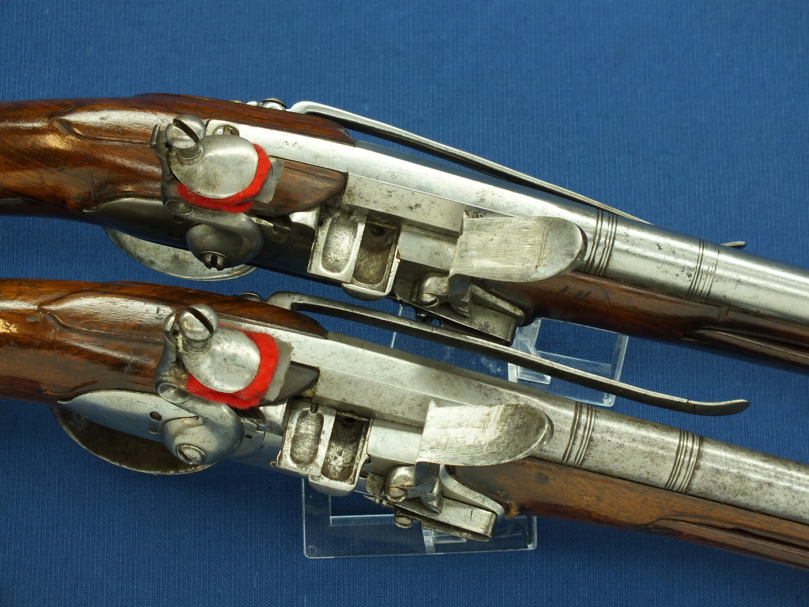 A rare antique Dutch or French 17th century circa 1660-70 Pair of over and under Flintlock pistols with Belt-hooks. Caliber 12mm, length 52. In very good condition. Price 12.500 euro.