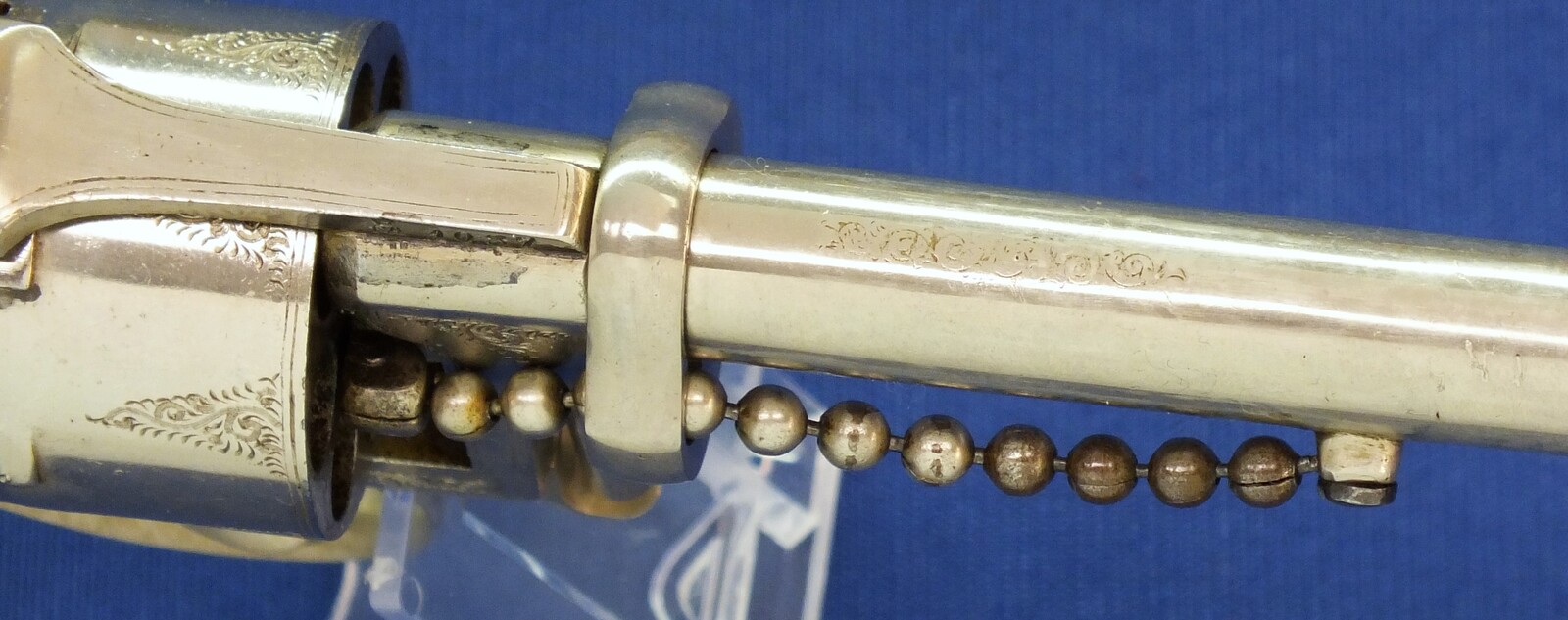 A rare antique English A. Fagnus Patent nr.1698 Nickel-plated and engraved 7 shot 9mm Pinfire Revolver. Length 28cm. In very good condition. Price 2.750 euro.