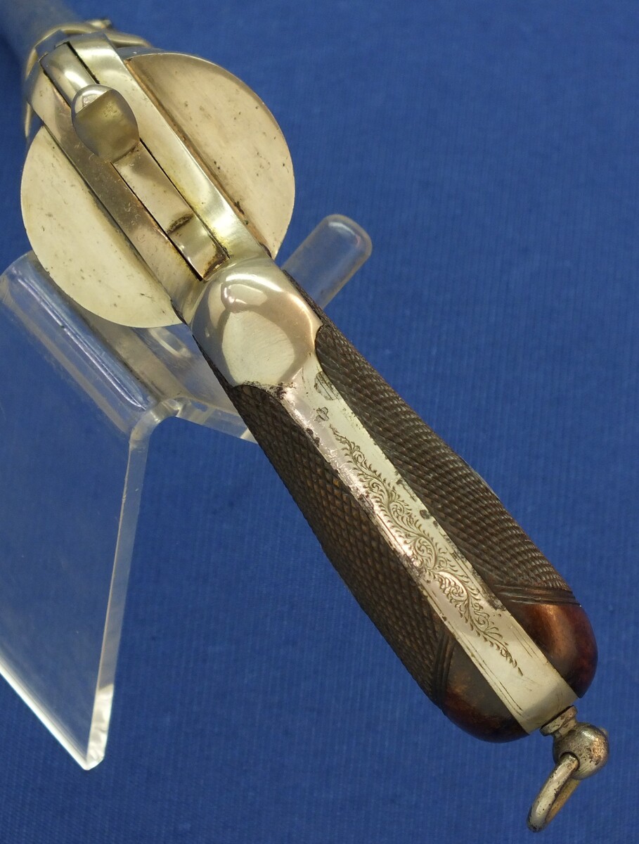 A rare antique English A. Fagnus Patent nr.1698 Nickel-plated and engraved 7 shot 9mm Pinfire Revolver. Length 28cm. In very good condition. Price 2.750 euro.