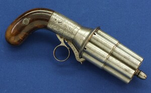 A rare fine antique engraved French Casimir Lefaucheux 6 shot 12mm Pinfire system Mariette Pepperbox. Circa 1850. Length 23cm. In very good condition. Price 2.995 euro