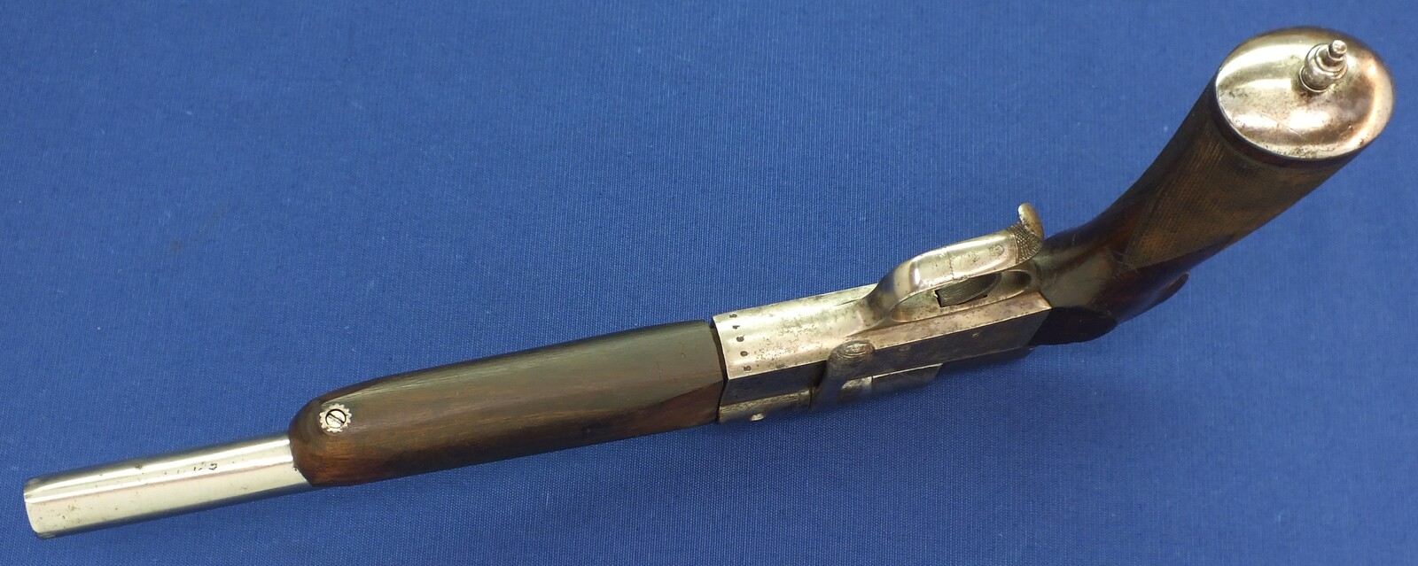 A rare French Buffalo-Stand Euréka bolt action 2 shot caliber 6mm and 9mm Rimfire Flobert Pistol. Length 40cm. In good condition. With original catalogue. Price 695 euro