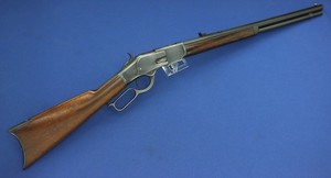 A scarce antique American Early First Model 1873 Winchester Rifle, very low serial nr. 17XX with special order set trigger. 44-40 caliber, length 106cm. In very good condition.