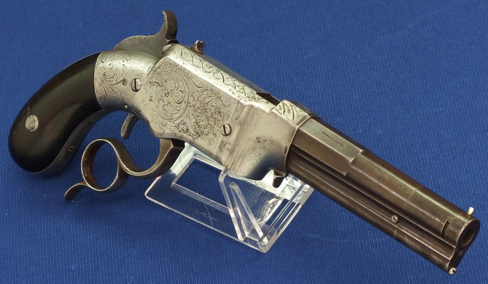 A scarce antique American Factory engraved Smith & Wesson Lever Action Repeating 31 Caliber No1 Pistol with 4 inch barrel. In very good condition. Price on request