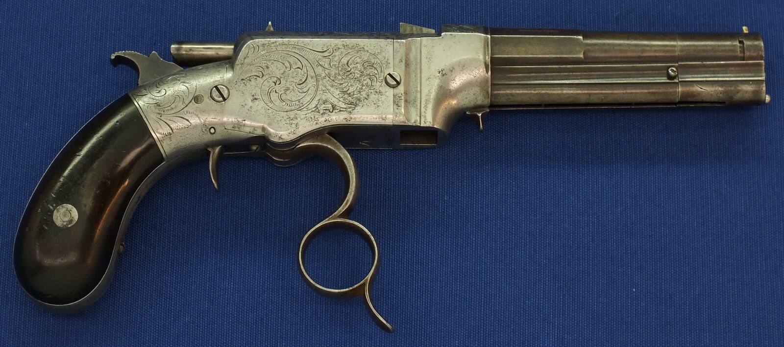 A scarce antique American Factory engraved Smith & Wesson Lever Action Repeating 31 Caliber No1 Pistol with 4 inch barrel. In very good condition. Price on request