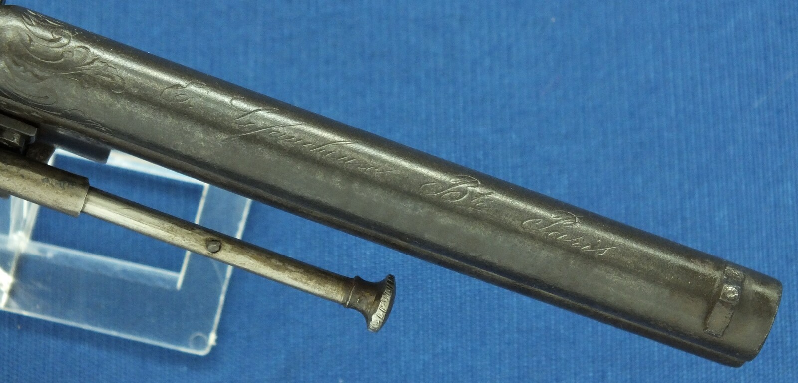 A scarce antique French 20 shot Pinfire Revolver. Signed on barrel: E. Lefaucheux Brevete a Paris. 7mm Caliber, length 27cm. In good/very good condition. Price 1.950 euro.