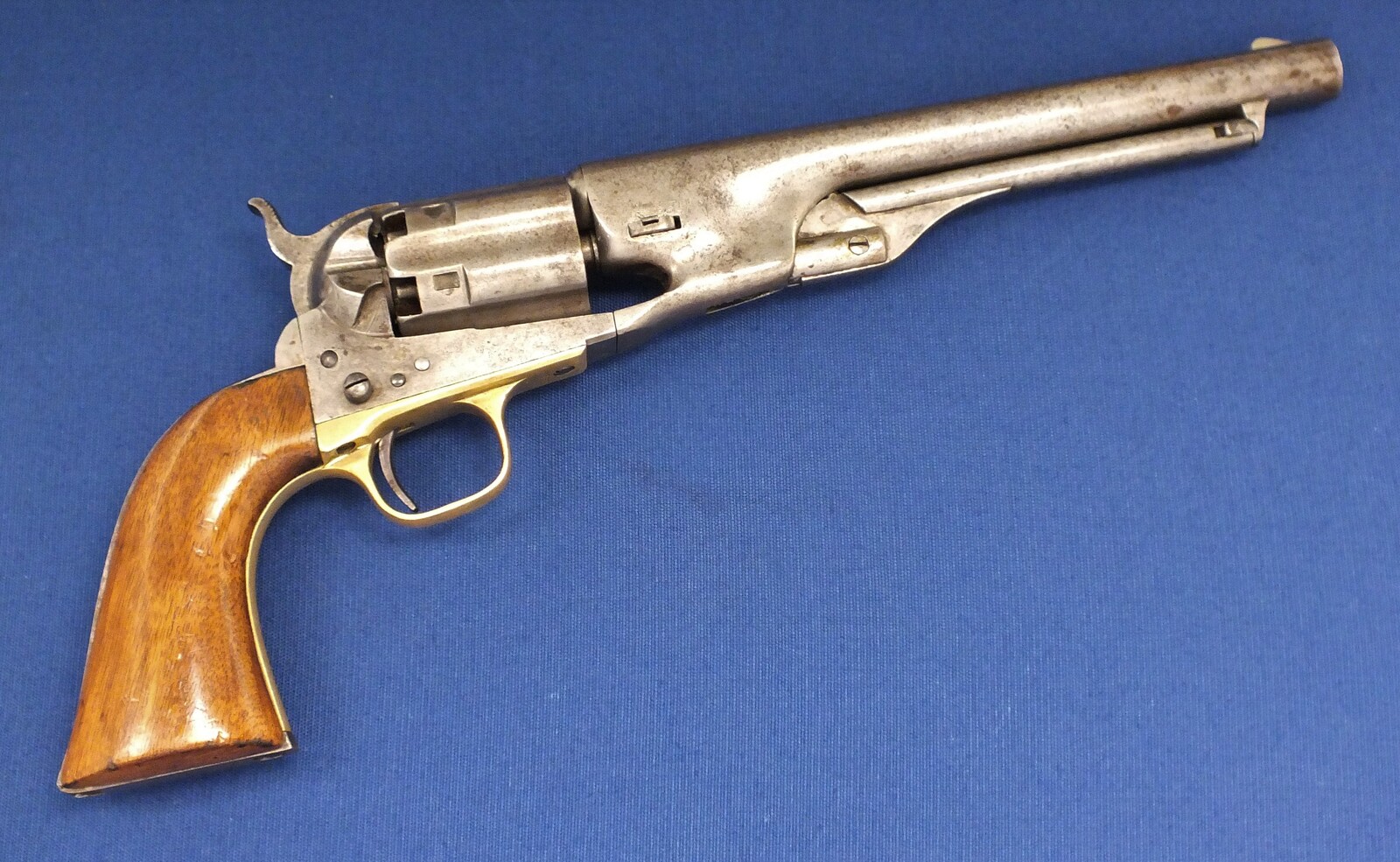 A scarce early 4 Screw Colt Model 1860 Army Percussion Revolver with Fluted Cylinder. .44 caliber, 8 inch barrel, 6 shot, in very good condition. 