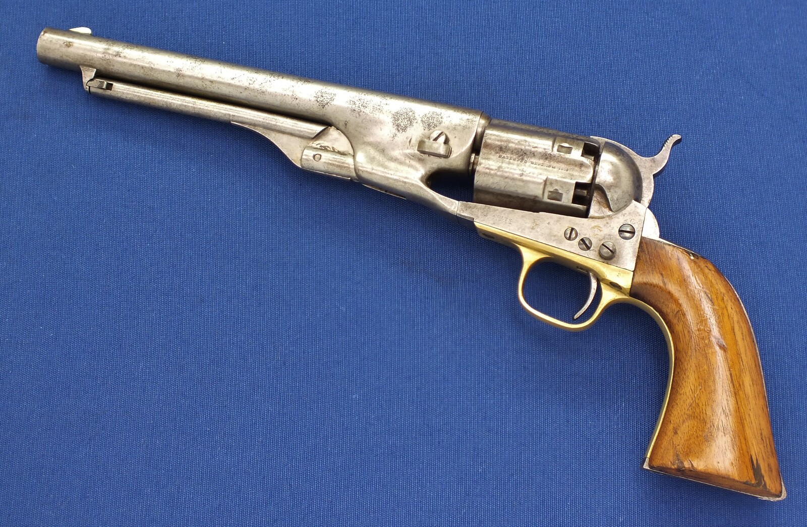 A scarce early 4 Screw Colt Model 1860 Army Percussion Revolver with Fluted Cylinder. .44 caliber, 8 inch barrel, 6 shot, in very good condition. 