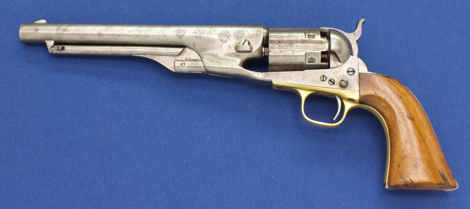 A scarce early 4 Screw Colt Model 1860 Army Percussion Revolver with Fluted Cylinder. .44 caliber, 8 inch barrel, 6 shot, in very good condition. 