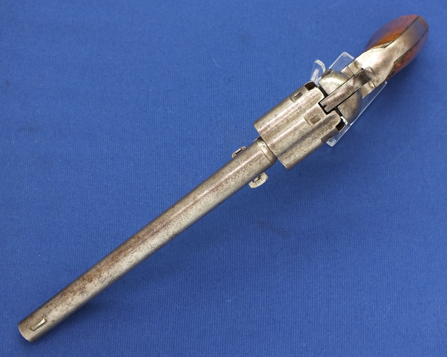 A scarce early 4 Screw Colt Model 1860 Army Percussion Revolver with Fluted Cylinder. .44 caliber, 8 inch barrel, 6 shot, in very good condition. 