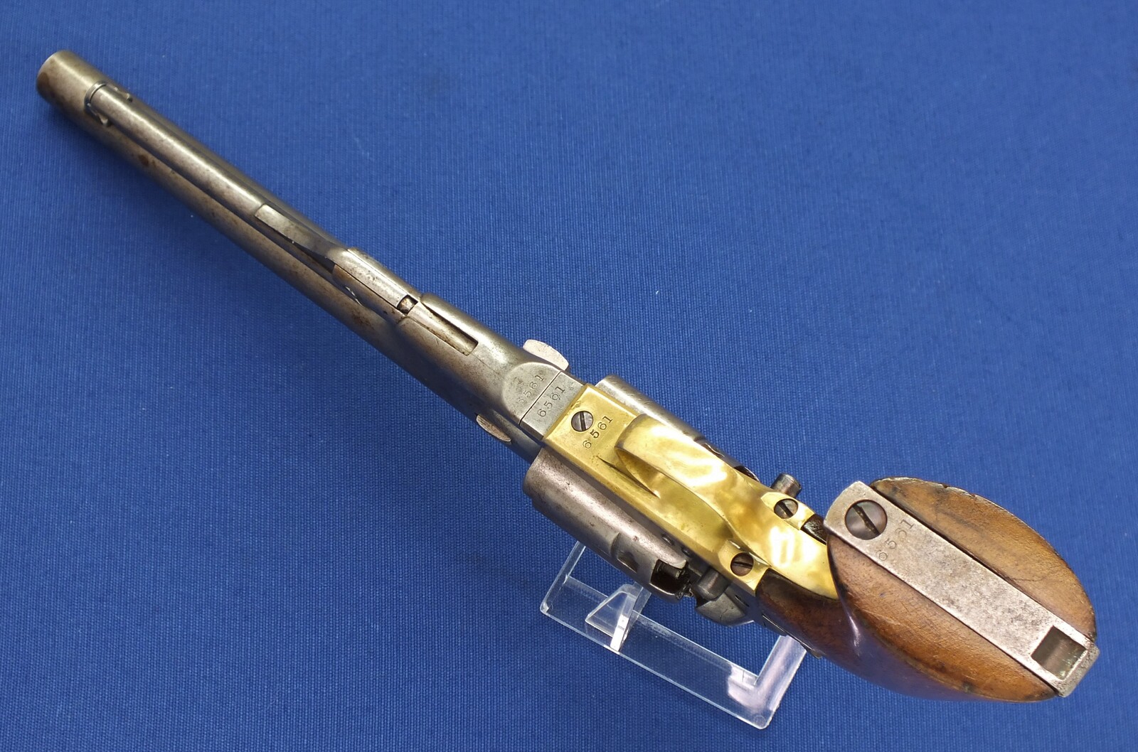 A scarce early 4 Screw Colt Model 1860 Army Percussion Revolver with Fluted Cylinder. .44 caliber, 8 inch barrel, 6 shot, in very good condition. 