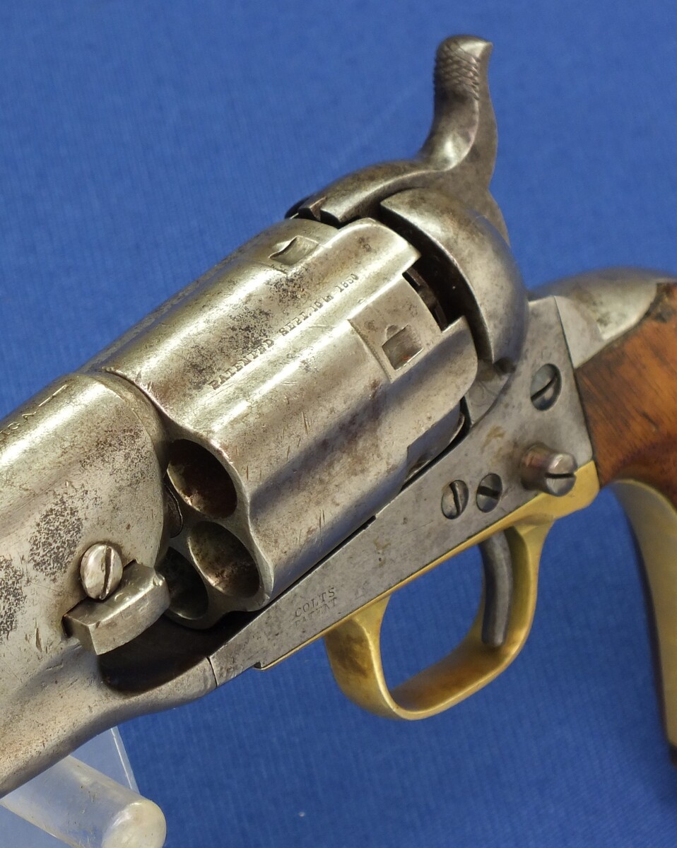 A scarce early 4 Screw Colt Model 1860 Army Percussion Revolver with Fluted Cylinder. .44 caliber, 8 inch barrel, 6 shot, in very good condition. 