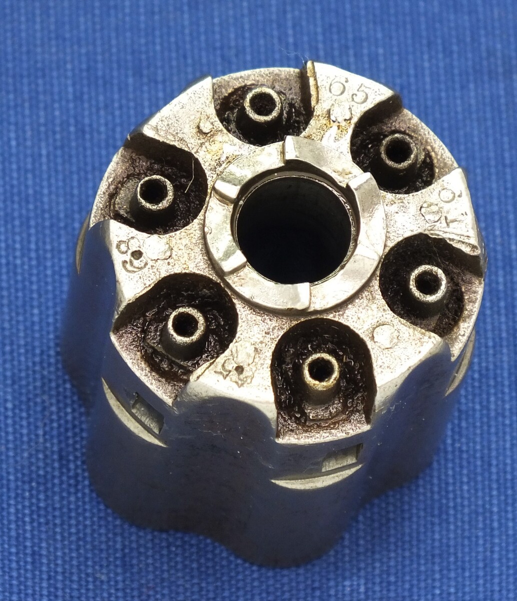 A scarce early 4 Screw Colt Model 1860 Army Percussion Revolver with Fluted Cylinder. .44 caliber, 8 inch barrel, 6 shot, in very good condition. 