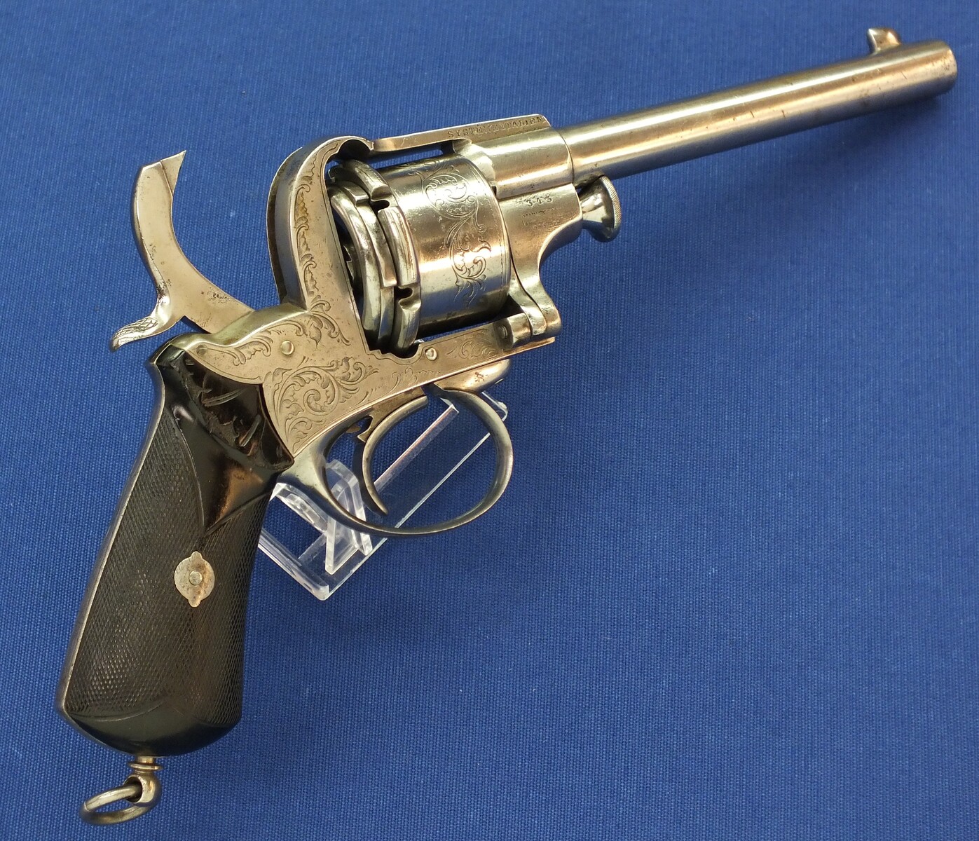 A scarce engraved French Breuer's Patent SYSTEME ITALIEN 6 shot 12mm Pinfire Revolver with swing-out Cylinder. Length 30cm. In very good condition. Price 2.950 euro.