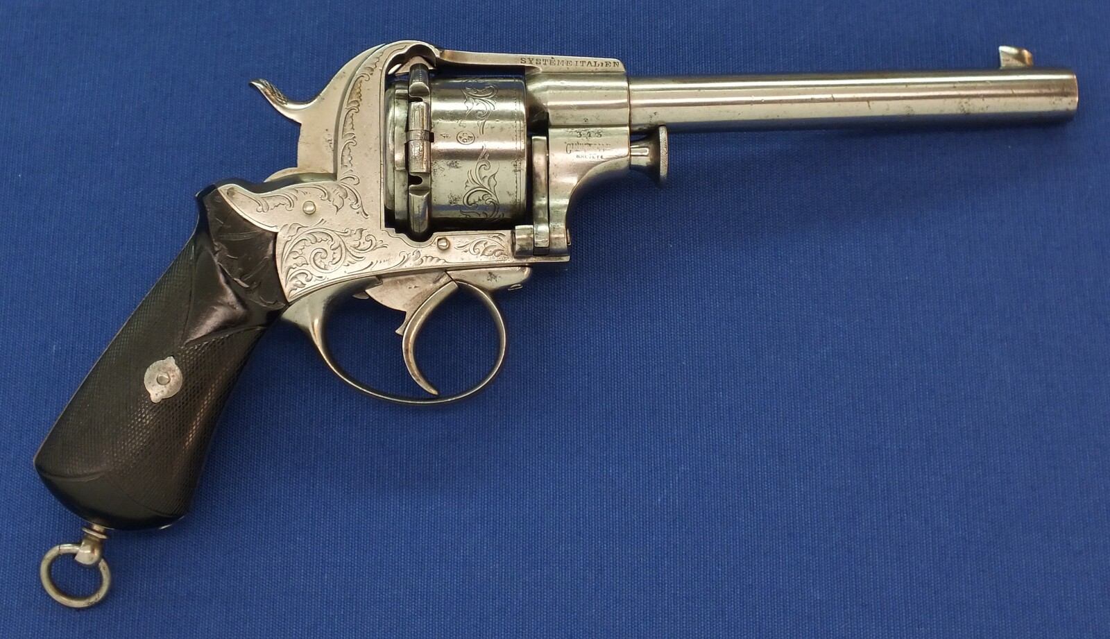A scarce engraved French Breuer's Patent SYSTEME ITALIEN 6 shot 12mm Pinfire Revolver with swing-out Cylinder. Length 30cm. In very good condition. Price 2.950 euro.