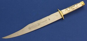 A Scottish made Bowie Knife by SCOBIE & Mc INTOSH GLASGOW. Length 49cm, blade 33cm. In very good condition. Price 695 euro.
