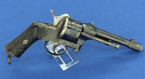 A very nice and rare fine engraved Belgian Pinfire sliding Lock Revolver probably made by Servais Mariette. Single and double action. 11 mm caliber, length 29 cm. In very good condition. Price 1.450,- euro