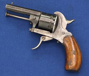 A very nice antique 19th century Belgian double and single action Pinfire Revolver, 6 shot, caliber 7 mm, length 17,5 cm, on the cylinder 