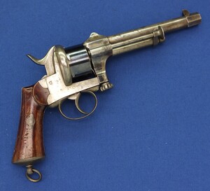 A very nice antique 19th century Belgian Pinfire Revolver, signed MARIETTE BREVETE (Guilome Mariette Liege 1862-1870), 6 shot,  caliber 12 mm, length 31 cm,  in very good condition. Price 1.500 euro