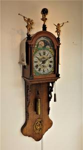 A very nice antique 19th century Dutch oak Frisian tail clock 