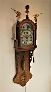 A very nice antique 19th century Dutch oak Frisian tail clock