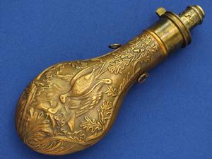 A very nice antique 19th Century English Embossed Powder Flask by SYKES SHEFFIELD,  height 21 cm, in very good condition. Price 375 euro