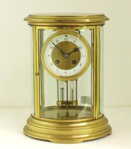 A very nice antique 19th century French oval mantel clock, 28 cm high. Price 1.250 euro