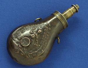 A very nice antique 19th century French Powderflask with a plunger type charger, signed 
