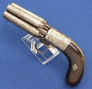 A very nice antique Belgian Liege rare 5 shot Percussion Pepperbox signed MARIETTE BREVETE, caliber 10 mm, length 20 cm, in good condition.