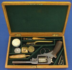 A very nice antique English London Armoury Company Oak cased Beaumont- Adams Patent 5 shot 54 bore percussion revolver by Robert Adams 76 King William Street London. In very good condition.
