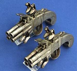 A very scarce antique 18th Century Belgian All Metal Pair 4 barreled Flintlock Wender Pistols by L.ROUMA A LIEGE, caliber 7 mm, lenght 18,5 cm, in very good condition. 