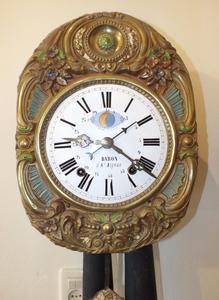 A very scarce antique 19th Century Comtoise Clock with Moon- and Date indication and on the penduleman automaton. Price 1.300 euro