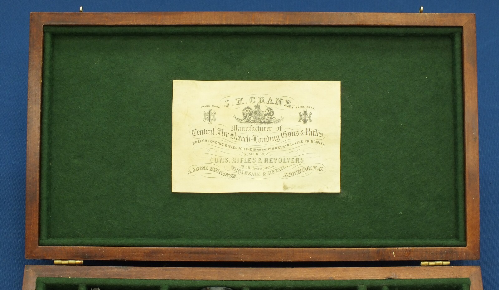 A Vintage Walnut case refitted and relined green interior made to fit Rogers & Spencer Single Action Army Revolver. 39x22x6cm. In very good condition. Price 350 euro.