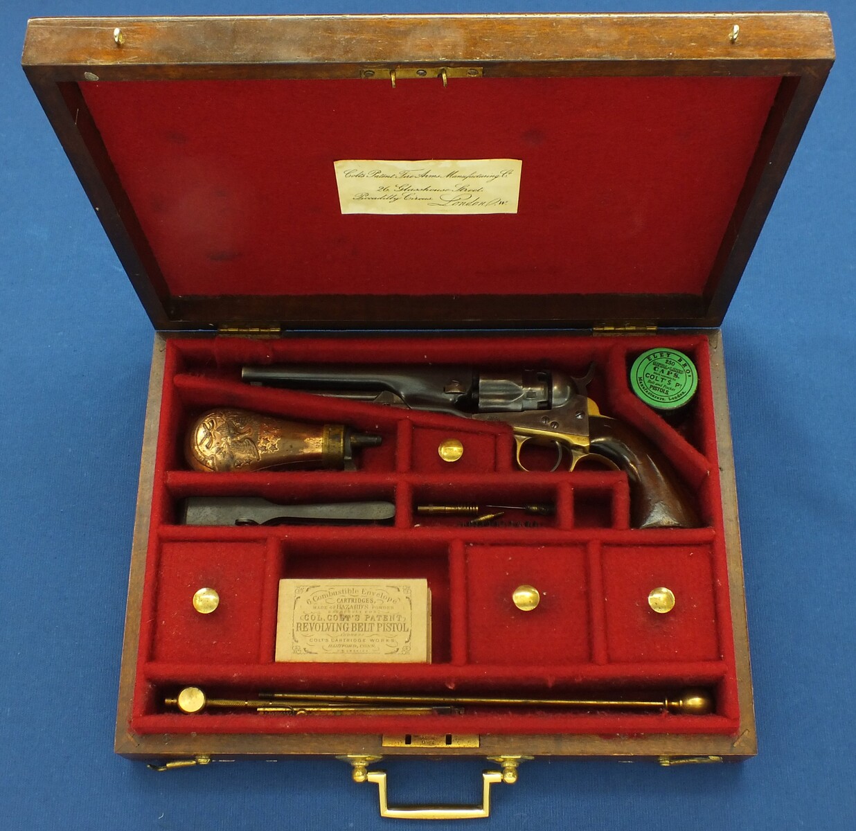 A Vintage/antique Oak case refitted and relined red interior made to fit Colt Model 1862 Police Percussion Revolver with 5,5 inch barrel. 34x25x7cm. In very good condition.