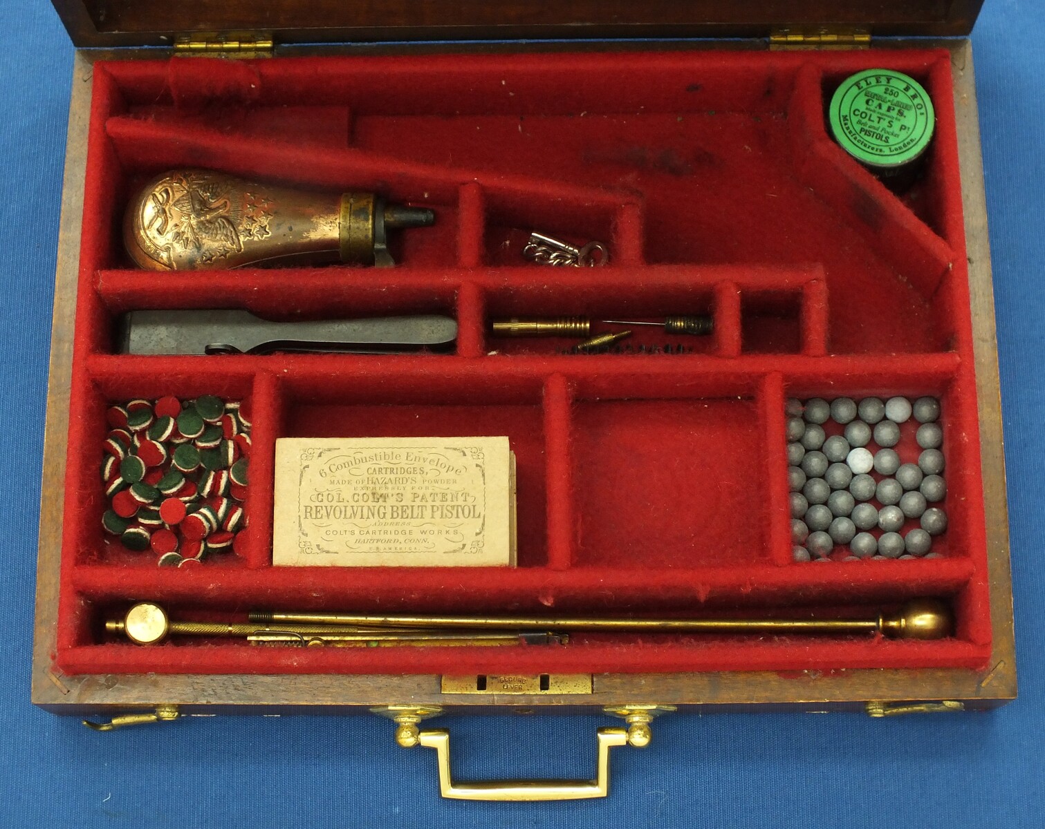 A Vintage/antique Oak case refitted and relined red interior made to fit Colt Model 1862 Police Percussion Revolver with 5,5 inch barrel. 34x25x7cm. In very good condition. Price 350 euro.