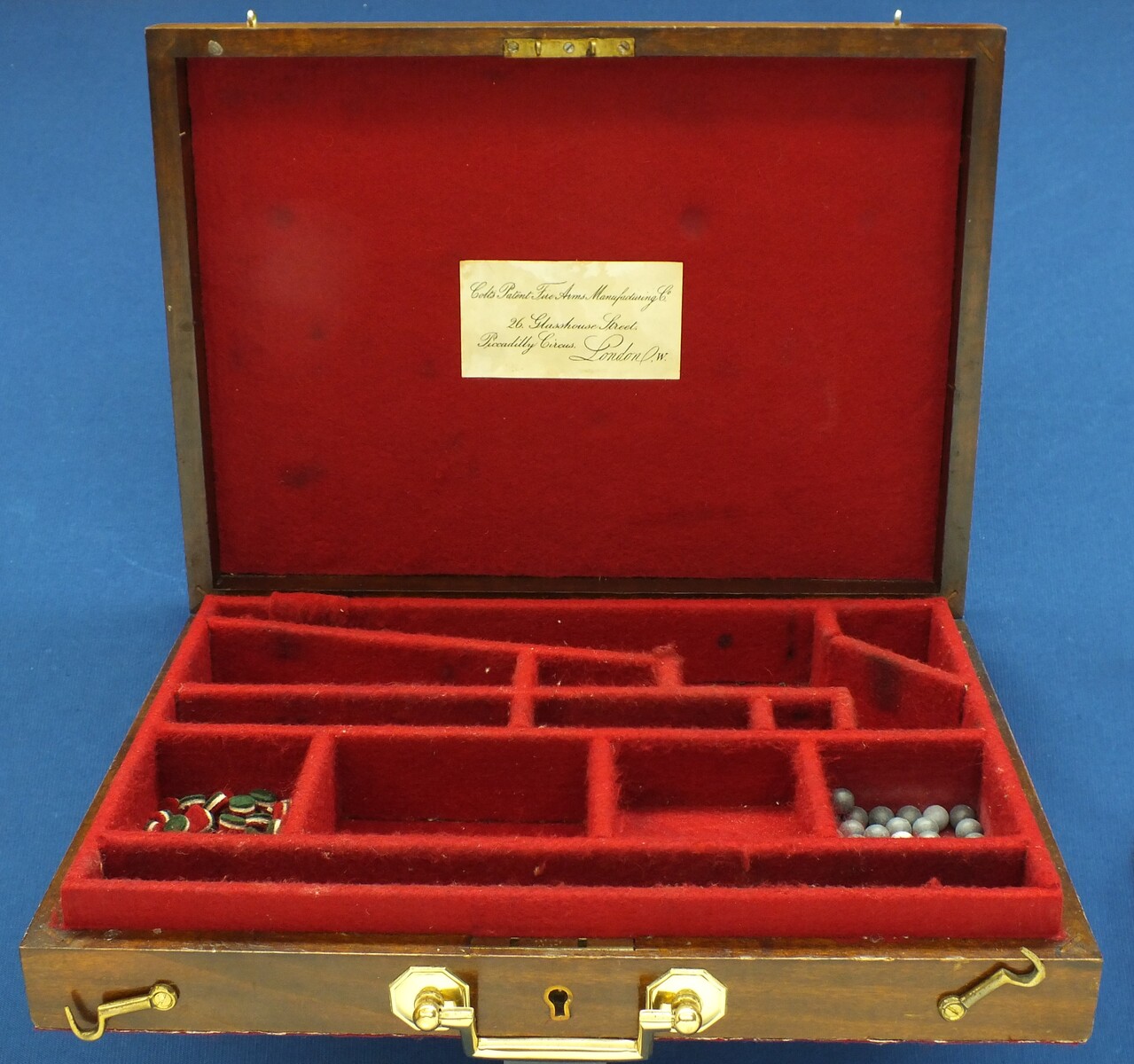 A Vintage/antique Oak case refitted and relined red interior made to fit Colt Model 1862 Police Percussion Revolver with 5,5 inch barrel. 34x25x7cm. In very good condition. Price 350 euro.