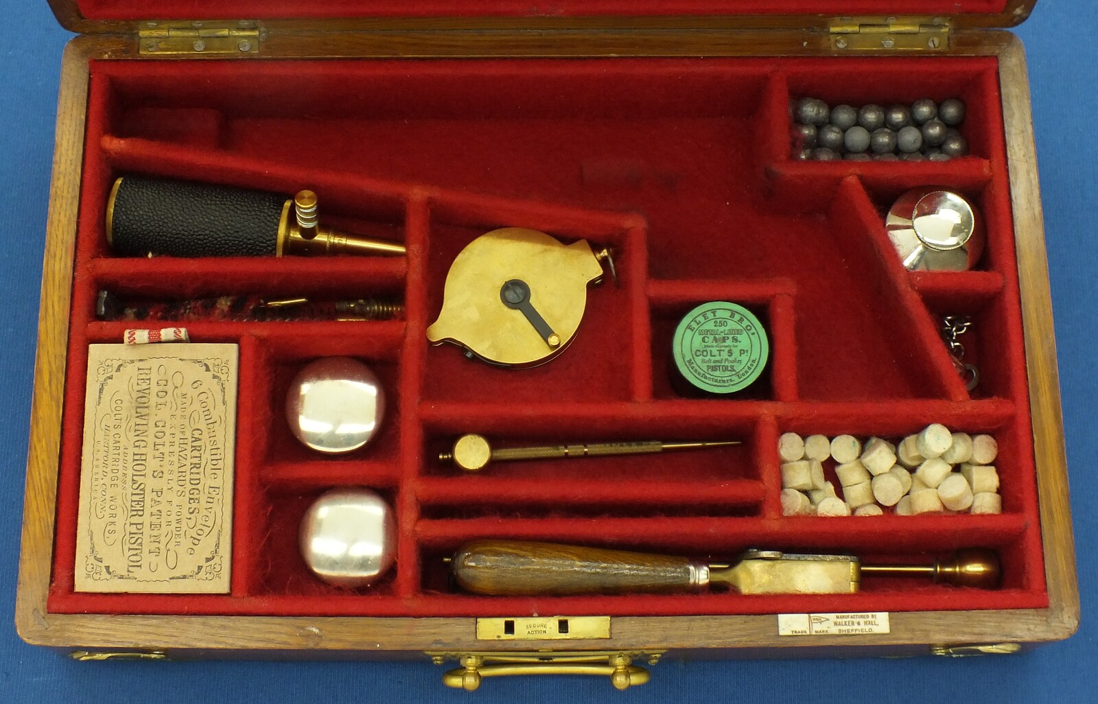 A Vintage/antique Oak case refitted and relined red interior made to fit Colt Single Action Army Percussion Revolver. 41x26x9cm. In very good condition.