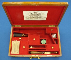 A Vintage/antique Oak case refitted and relined red interior made to fit Colt Single Action Army Percussion Revolver. 41x26x9cm. In very good condition. Price 350 euro.