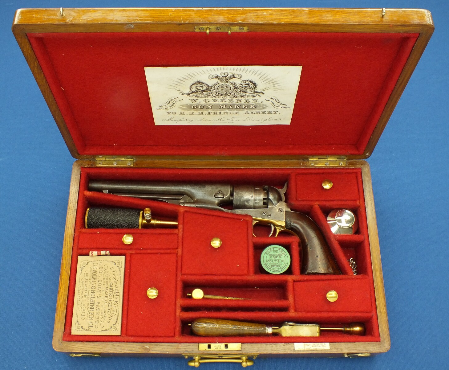 A Vintage/antique Oak case refitted and relined red interior made to fit Colt Single Action Army Percussion Revolver. 41x26x9cm. In very good condition. Price 350 euro.