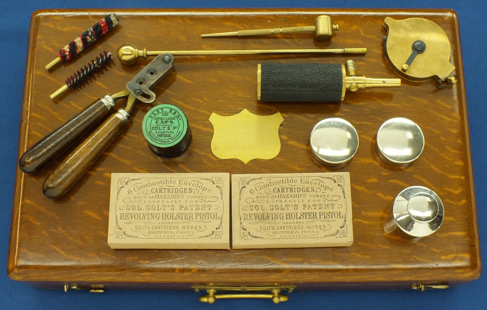 A Vintage/antique Oak case refitted and relined red interior made to fit Colt Single Action Army Percussion Revolver. 41x26x9cm. In very good condition. Price 350 euro.